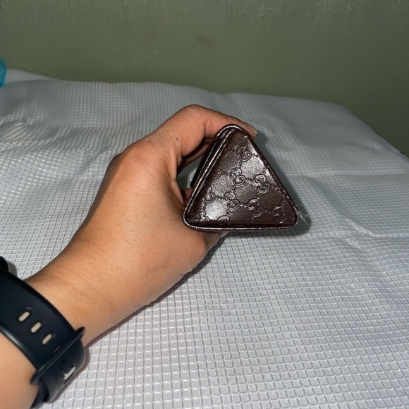 brown leather monogrammed foldable eyeglasses case from Gucci. - Picture 4 of 16